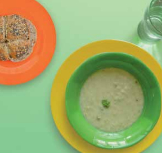 Vegetable soup and a bread roll