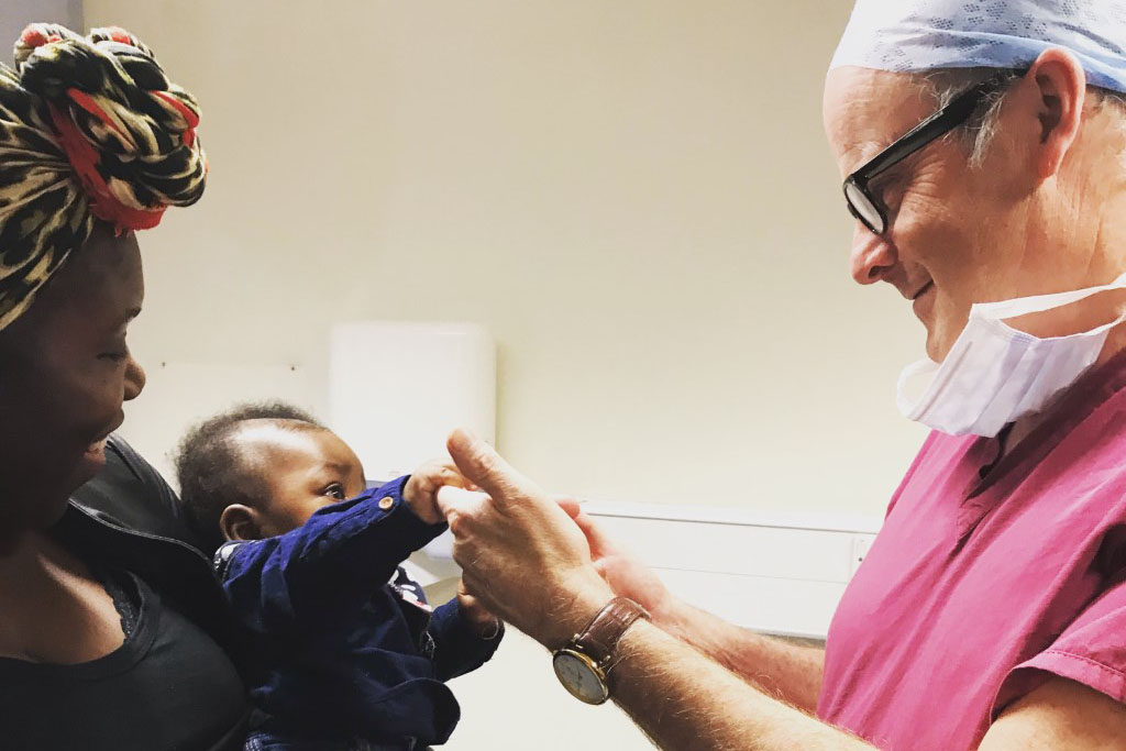 Obiele and Professor Shennan with her baby