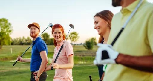 Golfers walking on a golf course